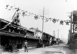 盛岡電気株式会社と清岡等社長(大正2年)の写真