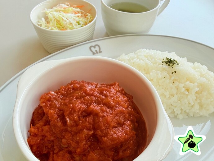 ハンバーグセット（トマト煮込み）の写真を掲載しています。